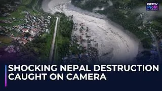 Thumbnail: Nepal Flood Aftermath: Aerial Footage Shows River Swollen, Towns Covered In Debris