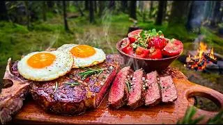 Thumbnail: Garlic Butter Steak Cooked Over a Campfire in Rainy Alaska Forest