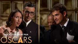 Thumbnail: 'The Singers' & 'Two People Exchanging Saliva' Win Best Live Action Short | 98th Oscars (2026)