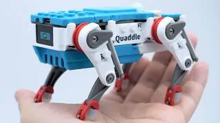 Thumbnail: Quaddle Talks Back: A Programmable Desk Robot That Backflips & Walks Ceiling - Open Source Robot Kit