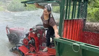 Thumbnail: Agricultural vehicle transporting timber during the flood season.