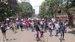 Thumbnail: A section of protesters walking through Nairobi CBD.