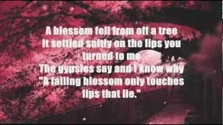 Thumbnail: Nat King Cole - A Blossom Fell (Lyrics)