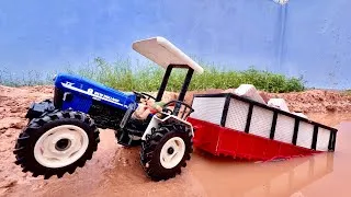 Thumbnail: Fully Loaded Trolley Stuck In Mud | New Holland 3630 Tractor Pulling By Swaraj 855 & John Deere |