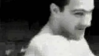 Thumbnail: Rocky Marciano showing biceps