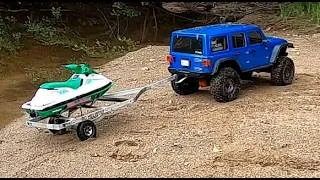 Thumbnail: Rc 1/6 scale sea doo launch and jeep scx 6 adventure.