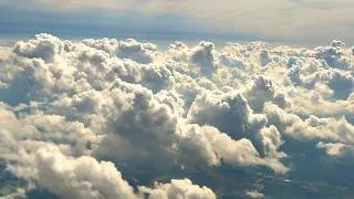 Thumbnail: Descending through the clouds into O'Hare International Airport