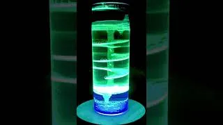 Thumbnail: Spiral Ramp Liquid Motion Bubbler With Wooden LED Display Base Underneath