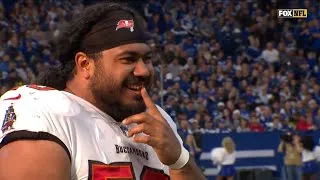 Thumbnail: Vita Vea loses a tooth after his helmet falls off mid-play and laughs it off