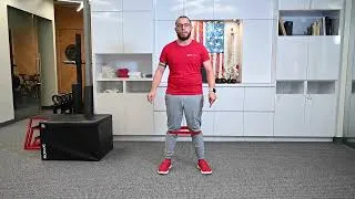 Thumbnail: 4. Physical therapist demonstrates banded squats at Rose Physical Therapy in Washington, DC