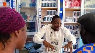 Thumbnail: Kouranko Toubabou dans la boutique de ballack électronique 