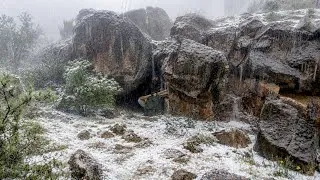 Thumbnail: caught in heavy rain & thunderstorm-building a survival shelter with fireplace under the giant rock