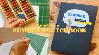 Thumbnail: Making a Summer Sketchbook 🌻 Beginner Sketchbook Binding 📓