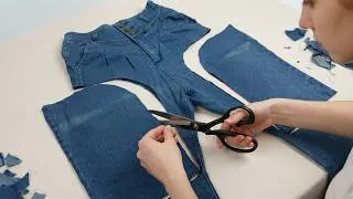 Thumbnail: Cut off the sides of an old pair of jeans and skillfully sew them into a unique item