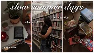 Thumbnail: SLOW SUMMER DAYS 📚✨🕯️🦋 library trip, organizing tbr cart, cozy reading vlog, thrifting, rainy week!