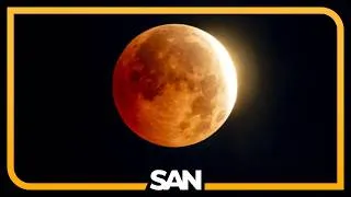 Thumbnail: Skywatchers get a dramatic look at a moon almost fully eclipsed