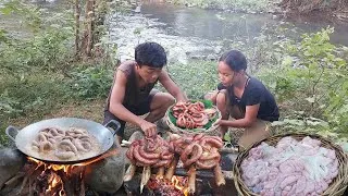 Thumbnail: Yummy! Pork intestine spicy braised for food in forest, Eating delicious