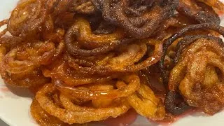 Thumbnail: রুহ আফজা দিয়ে মুচমুচে রসালো জিলাপি ,একদমই নতুন রেসিপি ।