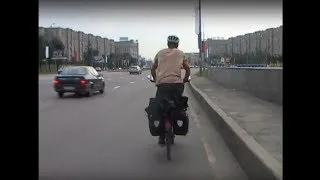 Thumbnail: Bicycling on a Russian Highway | Documentary Clip