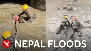 Thumbnail: Nepal rescuers crawl through thick mud to save trapped workers