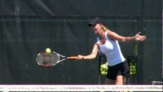 Thumbnail: Chris Evert and I prepare for a water break.