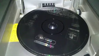 Thumbnail: Playstation 1 demo disc in old CD player