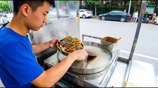 Thumbnail: How is this mesmerizing Chinese street pancake made?