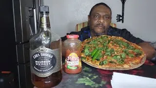Thumbnail: A pepperoni and sausage pizza with spinach all over it. I had too put whiskey in my picante sauce