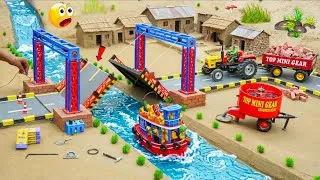 Thumbnail: DIY Mini Tractor Builds an Opening Brick Bridge | Amazing Boat Science Project | @topminigear