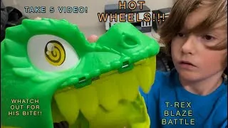 Thumbnail: HOT WHEELS T-REX BLAZE BATTLE!  T-REX IS BACK!  A TAKE FIVE VIDEO! FIVE MINUTES OF FUN AND GROWLS!