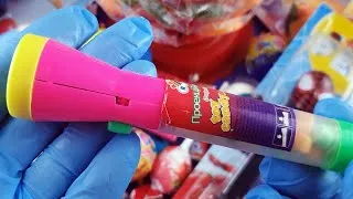 Thumbnail: A glowing flashlight with unknown candies. ASMR