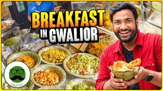Thumbnail: Breakfast Gwalior Food Tour Part 1 | Panwadi Poha, Shri Ram Kachori, Bahadura Ladoo | Veggie Paaji