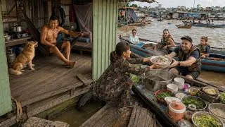 Thumbnail: No Kids, Just Their Dog: A Poor Couple Makes a Living on a Tiny Floating Breakfast Boat
