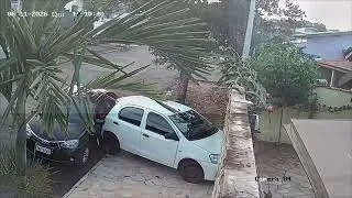 Thumbnail: Driver Backs Into Parked Car After Leaving Garage