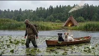 Thumbnail: A fishing camp on a wild river, a tent with a wood burning stove, and dogs