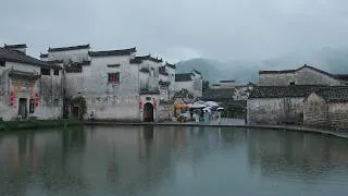 Thumbnail: China traditional village walk. Hongcun(宏村) in the rain is like a Chinese ink wash painting・4K