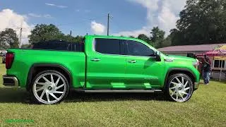 Thumbnail: Neon Slime Green GMC Sierra Truck on Big Cap 30s