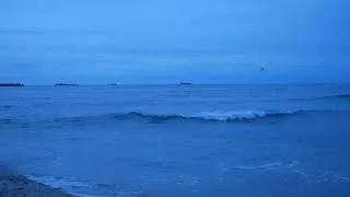 Thumbnail: 4K Sea Sounds: sunrise sky turns every shade of blue! Camera very close to the waves