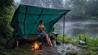 Thumbnail:     Completely Soaked in Heavy Rain | Building a Bushcraft Shelter & Campfire Cooking