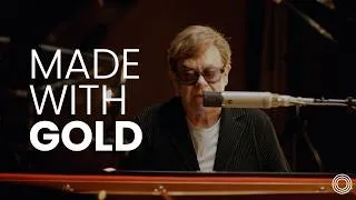 Thumbnail: Why the the world’s best studio microphones use gold: Elton John explains | Touched by Gold