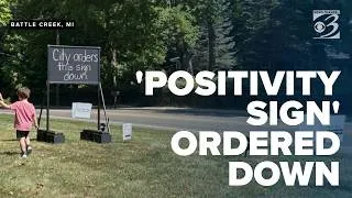 Thumbnail: Woman fights to keep positivity sign up as city says it violates ordinance