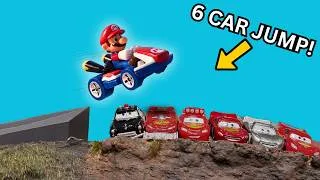 Thumbnail: Can Mario Clear 6 Cars?! Insane Mario Kart Hot Wheels Stunt Challenge
