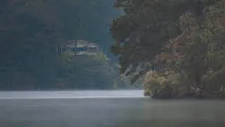 Thumbnail: rainy break time, staring at a house across the river