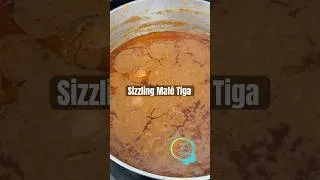 Thumbnail: Who else loves the sound of a sizzling stew ? #guineanfood #internationalfood #shorts
