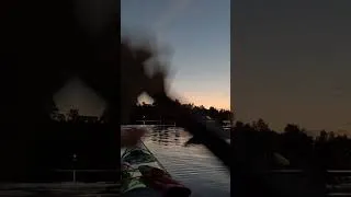 Thumbnail: Group of kayakers after sunset
