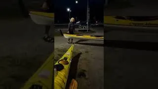 Thumbnail: Kayaks in the dark after sunset evening paddling trip