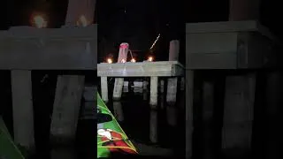 Thumbnail: Kayaking near dock in the dark