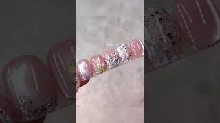 Thumbnail: 🌷 Soft sheer pink with delicate tulip details, sparkling crystals, n’ dreamy cat eye glow ✨ #nails
