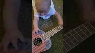 Thumbnail: Baby Bennet playing a ukulele
