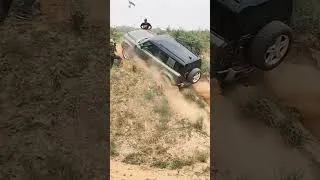 Thumbnail: Defender traction control makes it climb a tricky offroad climb.